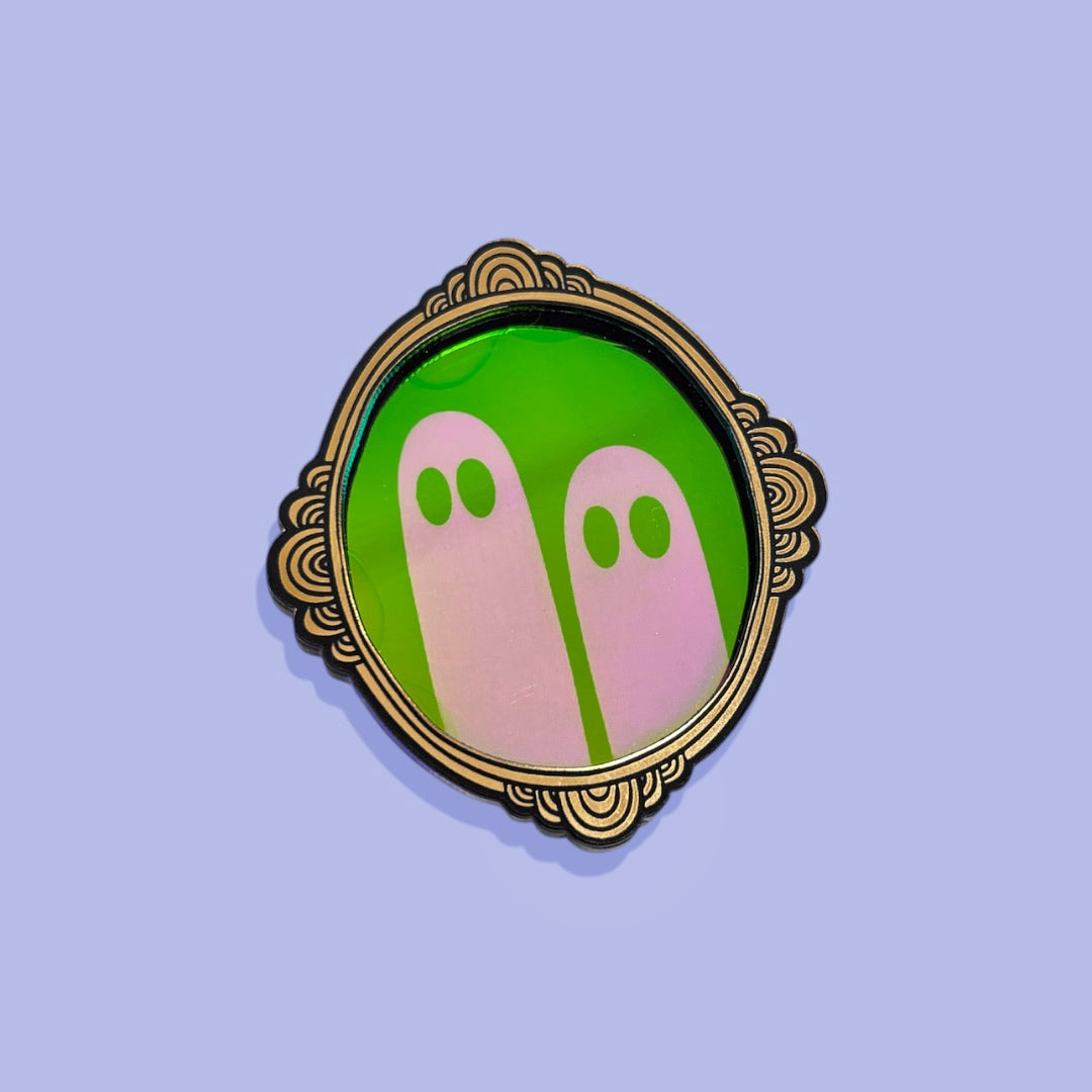 Broche espejo de fantasmas